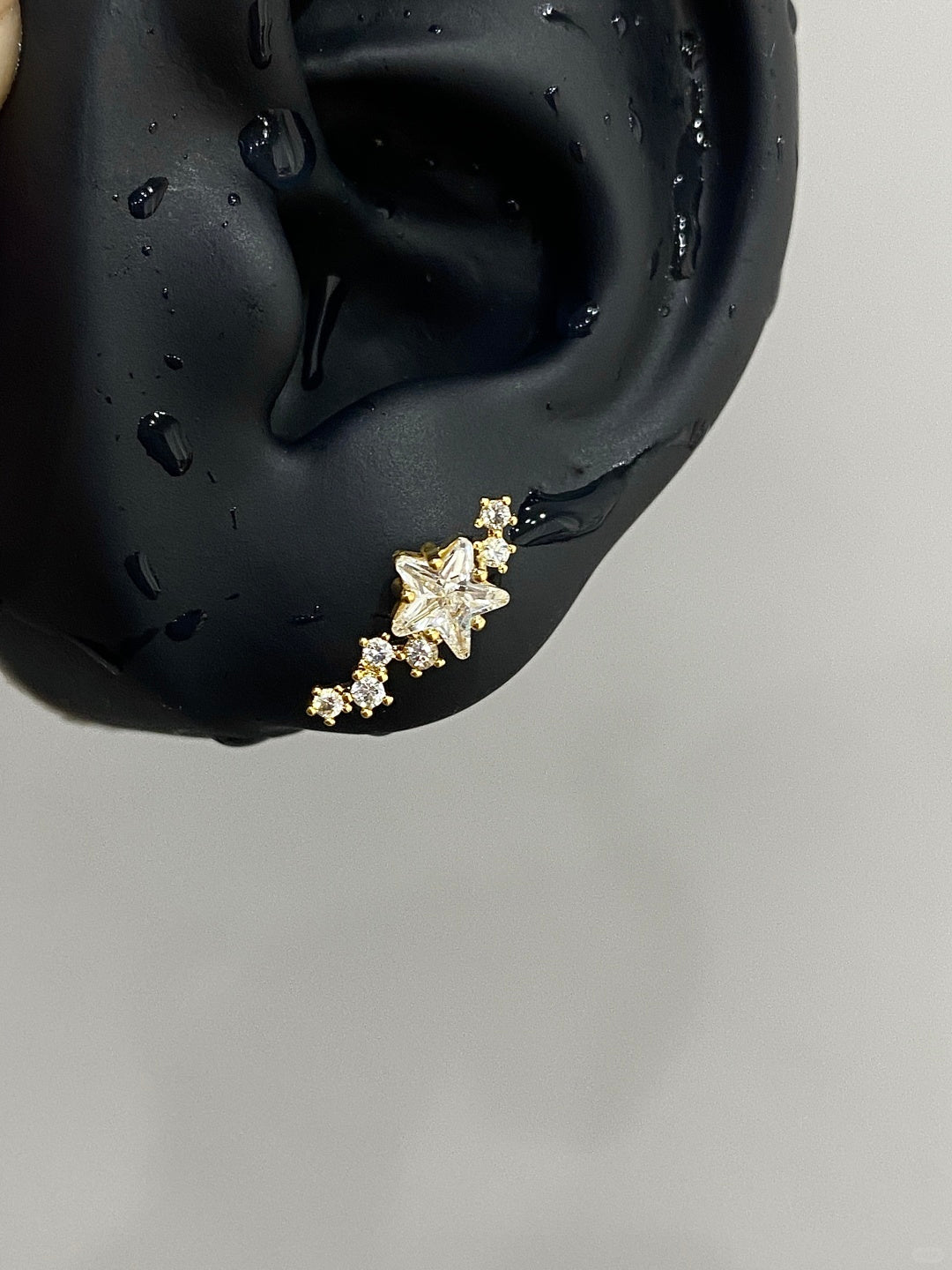 Gold Stellar Trail Helix Earrings