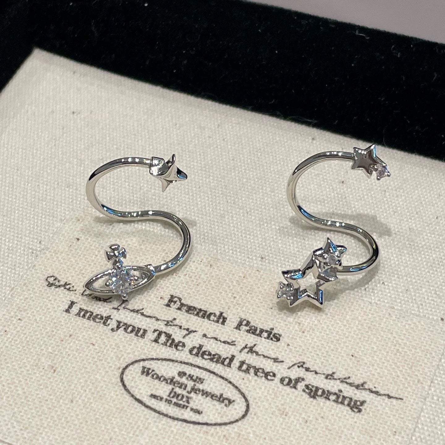 Swirling Star Conch Earrings